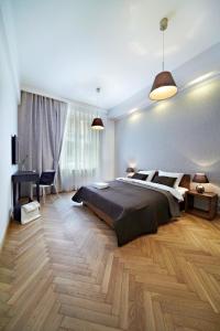 Postel nebo postele na pokoji v ubytování MOKO Apartments