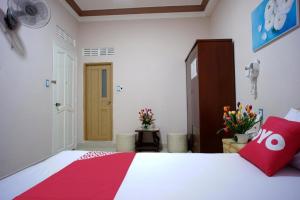 Postel nebo postele na pokoji v ubytování Thanh Thanh Nhan Hotel