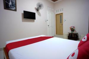 Postel nebo postele na pokoji v ubytování Thanh Thanh Nhan Hotel