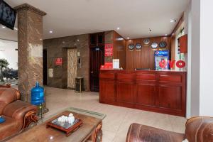 TV a/nebo společenská místnost v ubytování OYO 472 Lenka Hotel + 37 fotografií