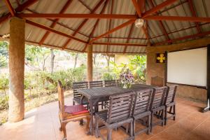 Fotografie z fotogalerie ubytování OYO 766 Zompo Baan Din Resort v destinaci Mae Taeng + 24 fotografií