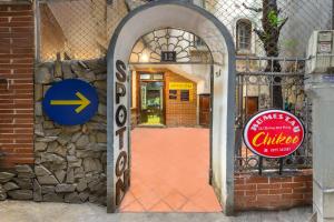 an entrance to a building with an open door at Chikoo Homestay spot-on in Hanoi +21 photos