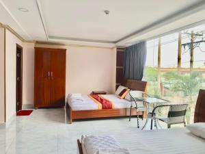 Posezení v ubytování Nhan Duc Hotel