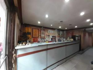 Kuchyň nebo kuchyňský kout v ubytování OYO 1011 First Hotel