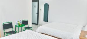 Katil atau katil-katil dalam bilik di Ngoc Anh Hotel Da Lat