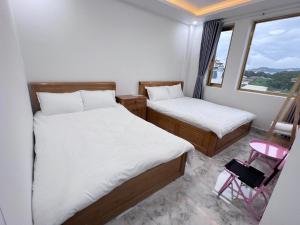 Katil atau katil-katil dalam bilik di Ngoc Anh Hotel Da Lat