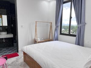 Katil atau katil-katil dalam bilik di Ngoc Anh Hotel Da Lat