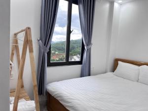 Katil atau katil-katil dalam bilik di Ngoc Anh Hotel Da Lat