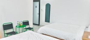 Katil atau katil-katil dalam bilik di Ngoc Anh Hotel Da Lat