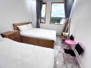 Katil atau katil-katil dalam bilik di Ngoc Anh Hotel Da Lat