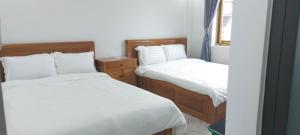 Katil atau katil-katil dalam bilik di Ngoc Anh Hotel Da Lat