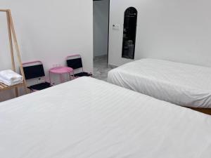 Katil atau katil-katil dalam bilik di Ngoc Anh Hotel Da Lat