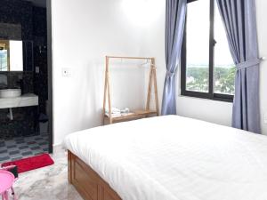 Katil atau katil-katil dalam bilik di Ngoc Anh Hotel Da Lat