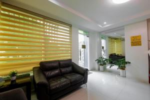 Posezení v ubytování JQV Hotel + 37 fotografií