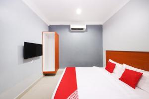 Postel nebo postele na pokoji v ubytování Super OYO 720 Corridor Hotel 2