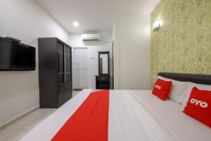 Postel nebo postele na pokoji v ubytování OYO 89497 Dream Nur Hotel + 37 fotografií