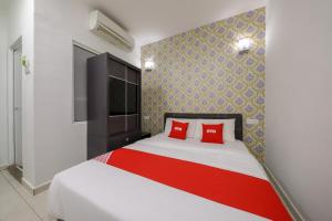 Postel nebo postele na pokoji v ubytování OYO 89497 Dream Nur Hotel