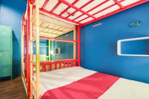 Postel nebo postele na pokoji v ubytování OYO 1074 Fin Hostel