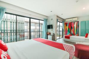 Postel nebo postele na pokoji v ubytování OYO 1074 Fin Hostel