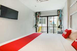 Postel nebo postele na pokoji v ubytování OYO 1074 Fin Hostel