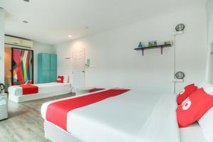 Postel nebo postele na pokoji v ubytování OYO 1074 Fin Hostel