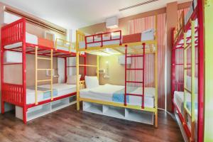 Postel nebo postele na pokoji v ubytování OYO 1074 Fin Hostel