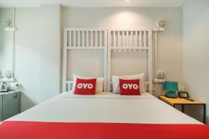 Postel nebo postele na pokoji v ubytování OYO 1074 Fin Hostel