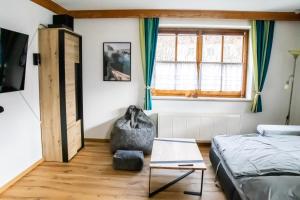 Posteľ alebo postele v izbe v ubytovaní Home-Schusterwastl