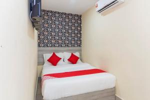 Postel nebo postele na pokoji v ubytování OYO 552 Hotel Kl Centre Point
