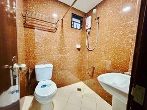 Koupelna v ubytování OYO 1045 Rayjan Apartelle