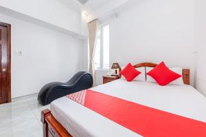 Postel nebo postele na pokoji v ubytování OYO 446 The Bao Hotel