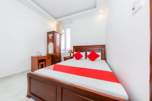 Postel nebo postele na pokoji v ubytování OYO 446 The Bao Hotel