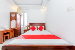 Postel nebo postele na pokoji v ubytování OYO 446 The Bao Hotel