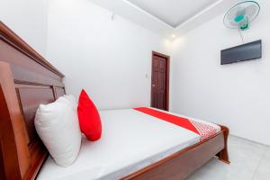 Postel nebo postele na pokoji v ubytování OYO 446 The Bao Hotel