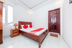 Postel nebo postele na pokoji v ubytování OYO 446 The Bao Hotel