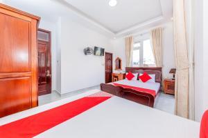 Postel nebo postele na pokoji v ubytování OYO 446 The Bao Hotel