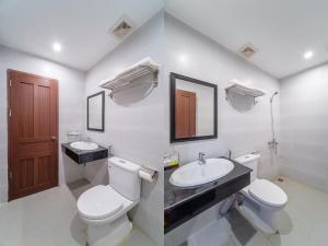 A bathroom at Capital O 215 An Duc Hotel Da Nang