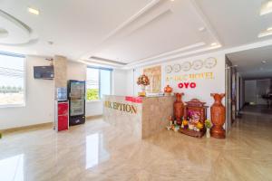 The lobby or reception area at Capital O 215 An Duc Hotel Da Nang
