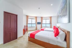Voodi või voodid majutusasutuse Capital O 215 An Duc Hotel Da Nang toas