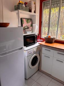 Kuchyň nebo kuchyňský kout v ubytování Appart Milena T2 cosy et calme