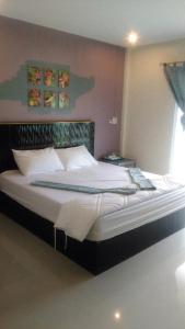 Fotografie z fotogalerie ubytování OYO 1029 Os Rooms v destinaci Nai Yang pláž