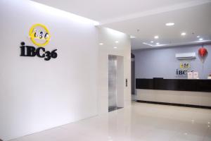 an office lobby with a hbcx sign on the wall at Hotel O iBC36 Business Stay in Kuching