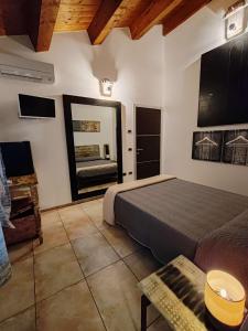 Postel nebo postele na pokoji v ubytování B&B Flavio e Catia