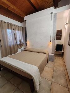 Postel nebo postele na pokoji v ubytování B&B Flavio e Catia