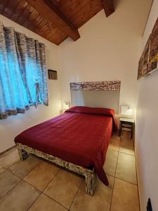 Postel nebo postele na pokoji v ubytování B&B Flavio e Catia