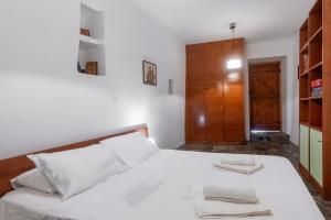 Posteľ alebo postele v izbe v ubytovaní Aegean Cottage