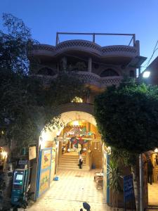 an entrance to a building with a person walking through it at Tunis Vista in Tunis