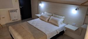 Postel nebo postele na pokoji v ubytování Ex Hostal del Parque