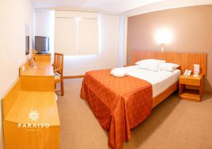 Postel nebo postele na pokoji v ubytování Hoteles Paraiso TRUJILLO