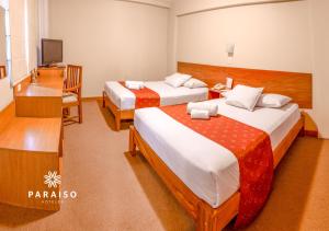 Postel nebo postele na pokoji v ubytování Hoteles Paraiso TRUJILLO